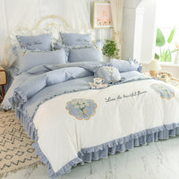 HKM-684435 Summer Ruffled Cotton Four-Piece Bedding Set with Heart Embroidery and Floral Quilt Cover