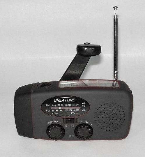 HKM-710355 Solar Hand Crank USB Charging Radio Flashlight in Red - Compact and Lightweight Emergency Device