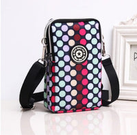 HKM-767379 Stylish Vertical Mobile Phone Bag with Zipper Closure and Vibrant Print Designs