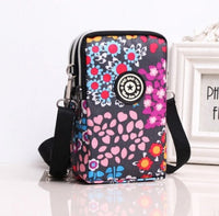 HKM-767379 Stylish Vertical Mobile Phone Bag with Zipper Closure and Vibrant Print Designs