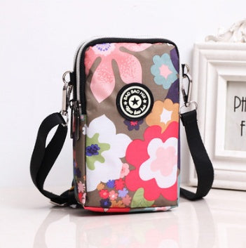 HKM-767379 Stylish Vertical Mobile Phone Bag with Zipper Closure and Vibrant Print Designs