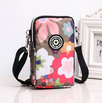 HKM-767379 Stylish Vertical Mobile Phone Bag with Zipper Closure and Vibrant Print Designs