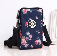 HKM-767379 Stylish Vertical Mobile Phone Bag with Zipper Closure and Vibrant Print Designs