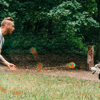 HKM-779091 New Pet Draw Rope Hand Throwing Ball ABS Grinding Teeth Resistant Chew Dog Training Ball