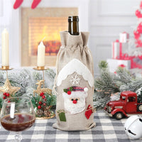 HKM-780243 Linen Christmas Wine Bottle Covers - Set of 3 Santa, Deer, and Snowman Designs