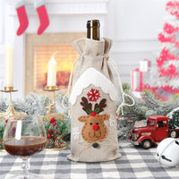 HKM-780243 Linen Christmas Wine Bottle Covers - Set of 3 Santa, Deer, and Snowman Designs