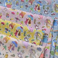 HKM-801875 Cotton Fabric with Summer Rabbit Illustration in Smoke Blue and Light Yellow for Clothing