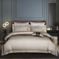 HKM-808787 Four-Piece Long-Staple Cotton Bedding Set in Plain Jacquard with Lace Detailing