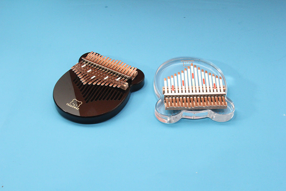 HKM-869843 Transparent Crystal 17-Tone Finger Piano with Accessories and Case