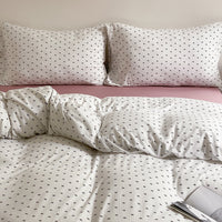 HKM-965715 Cotton Knitted Printed Four-Piece Bedding Set with Geometric, Floral, and Animal Patterns