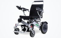 HKM-0881107 Light Folding Electric Wheelchair Dual 250W Motors 24V Dual 6Ah Battery 12.4 Mile Range 265 lb Capacity 6061 Aluminum